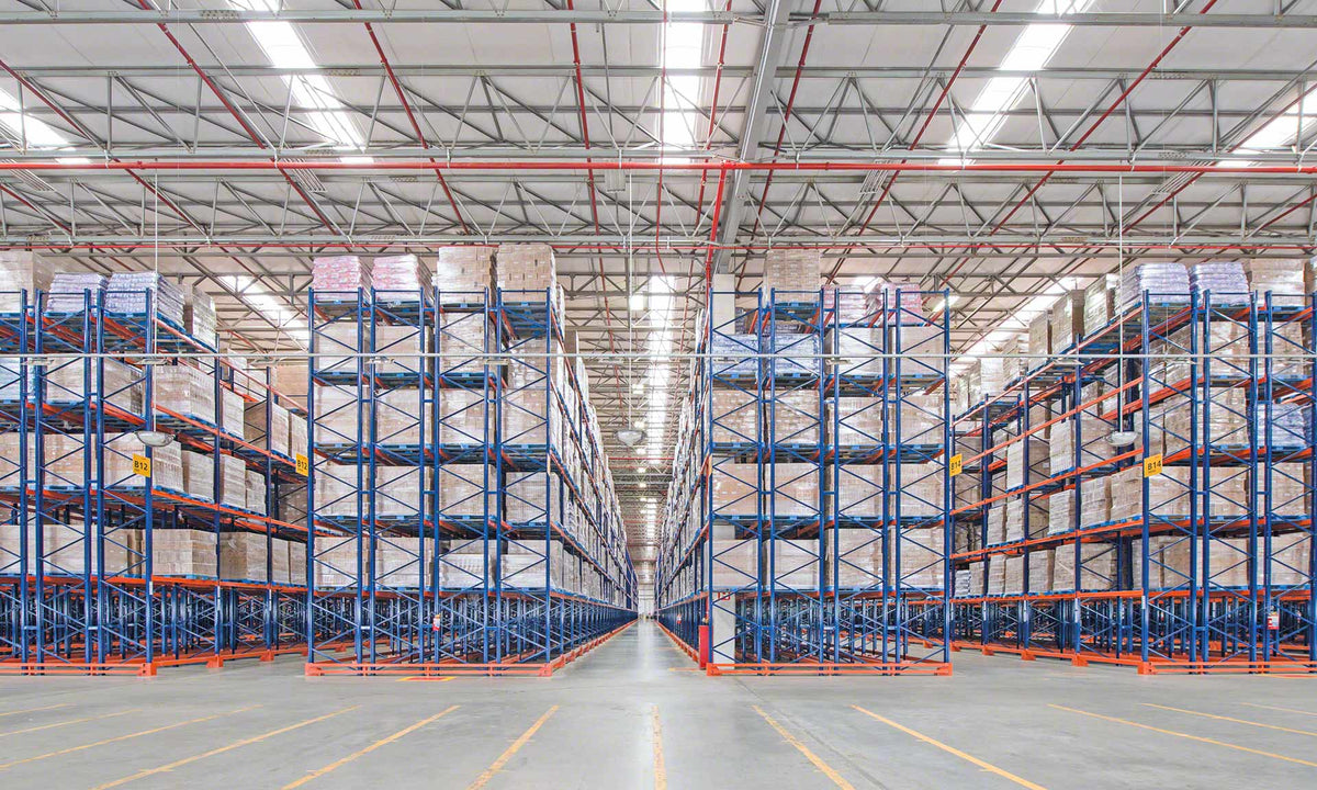 Double-deep pallet racking installation with loaded pallets and warehouse aisles
